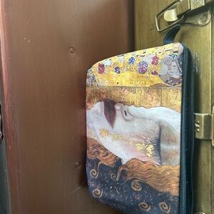 Artistic Zippered Pouch with Gold and Brown Design